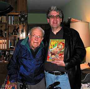 Jack Williamson, then 95, poses with Edelman and a copy of the December 1928 Amazing Stories magazine, which contains his first published story. Photo courtesy of Scott Edelman.