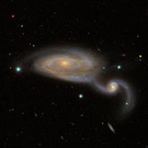 A galactic merger.  Image courtesy of Oxford University. 