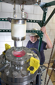 COUPP collaborator Andrew Sonnenschein checks on the 4kg bubble chamber in in the MINOS hall at Fermilab in 2005. 
