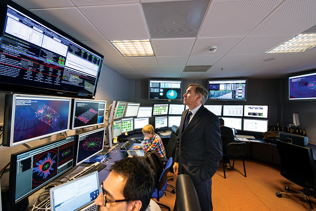 Photo of (CMS control room): physicist and CMS Spokesperson Joe Incandela watches a continually updating display of events