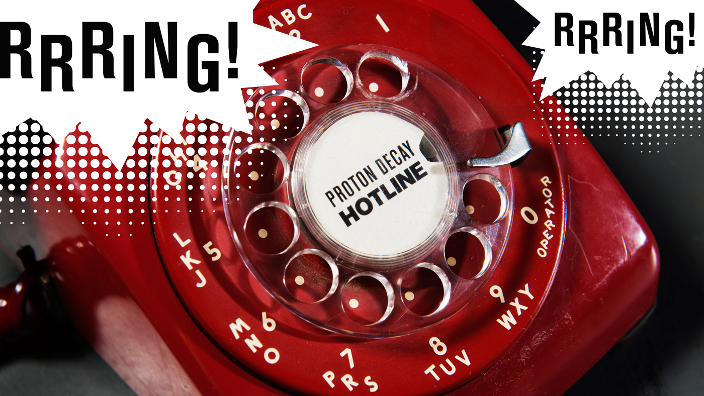 Old red dial telephone that says "Rrring!"