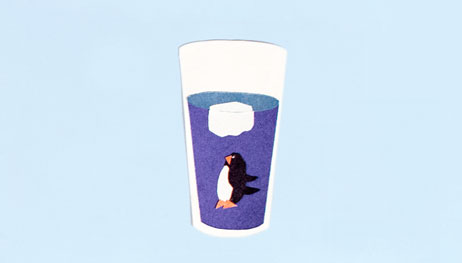 Illustration of penguin at the bottom of water glass beneath ice cube