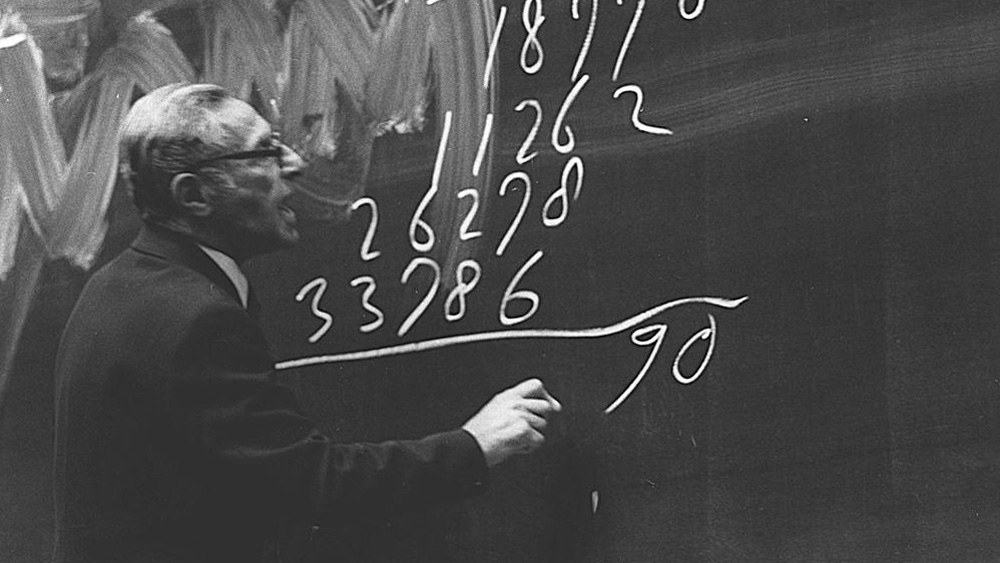 Photo of Wim Klein at blackboard