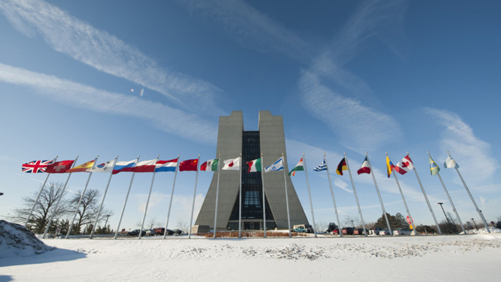 Photo of Wilson Hall with international flags