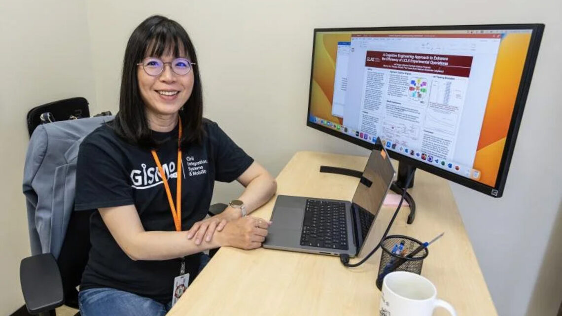 SLAC associate staff scientist Wan-Lin Hu at her computer work station.