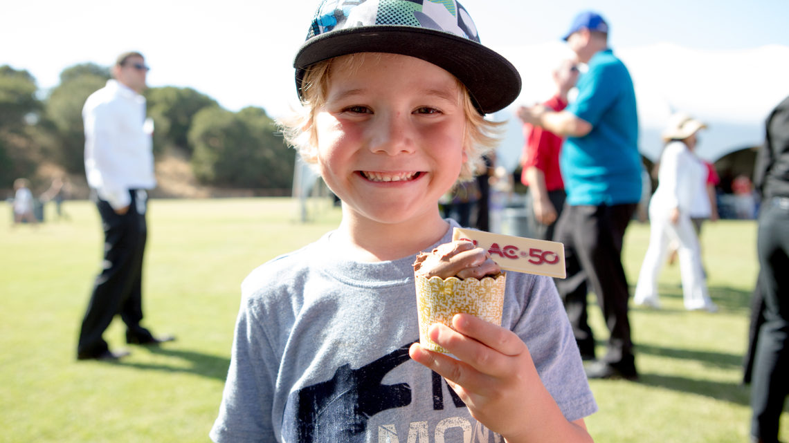Photo of boy holding ice cream at SLAC Anniversary picnic