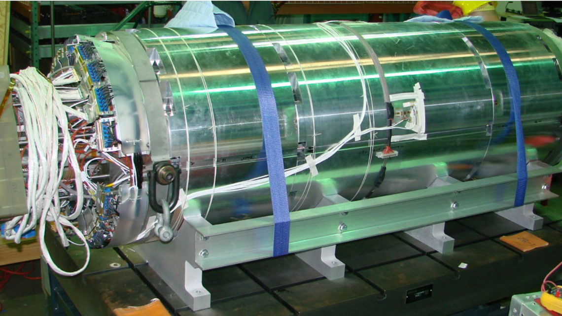 Photo of the 1.5-meter prototype magnet, the MQXF1 quadrupole, sits at Fermilab before testing