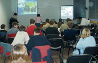 Students around the world participate in videoconferences, lectures, and analysis of particle physics data.