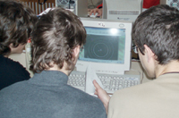 Students around the world participate in videoconferences, lectures, and analysis of particle physics data.