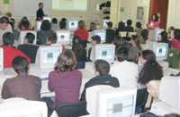 Students around the world participate in videoconferences, lectures, and analysis of particle physics data.