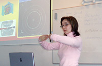 Students around the world participate in videoconferences, lectures, and analysis of particle physics data.