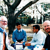 During their stays at other labs, physicists learn that it's a small world after all.