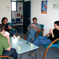 During their stays at other labs, physicists learn that it's a small world after all.