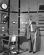 Enrico Fermi at the controls of the Chicago Synchrocyclotron at the University of Chicago.