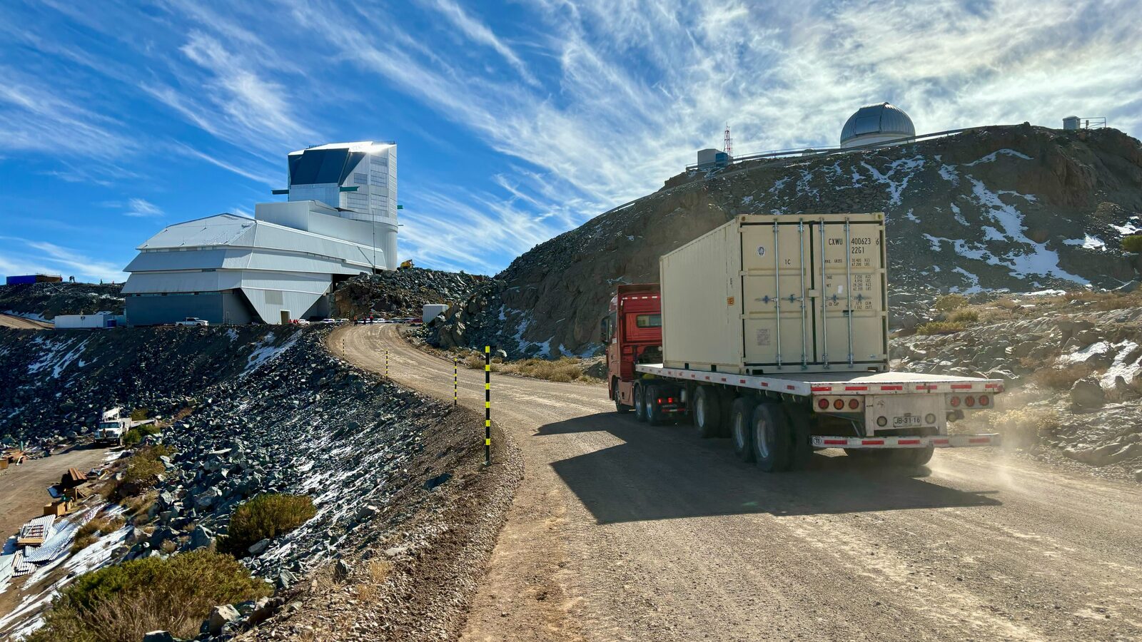 The shipping crate holding the LSST Camera is transported the final 35 kilometers (21.7 miles) up the winding dirt road to the observatory on the summit of Cerro Pachón.