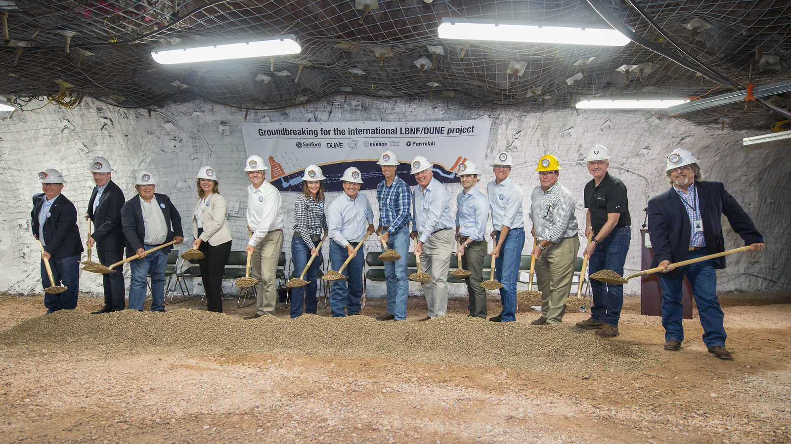 Fourteen shovelers mark the start of LBNF construction.