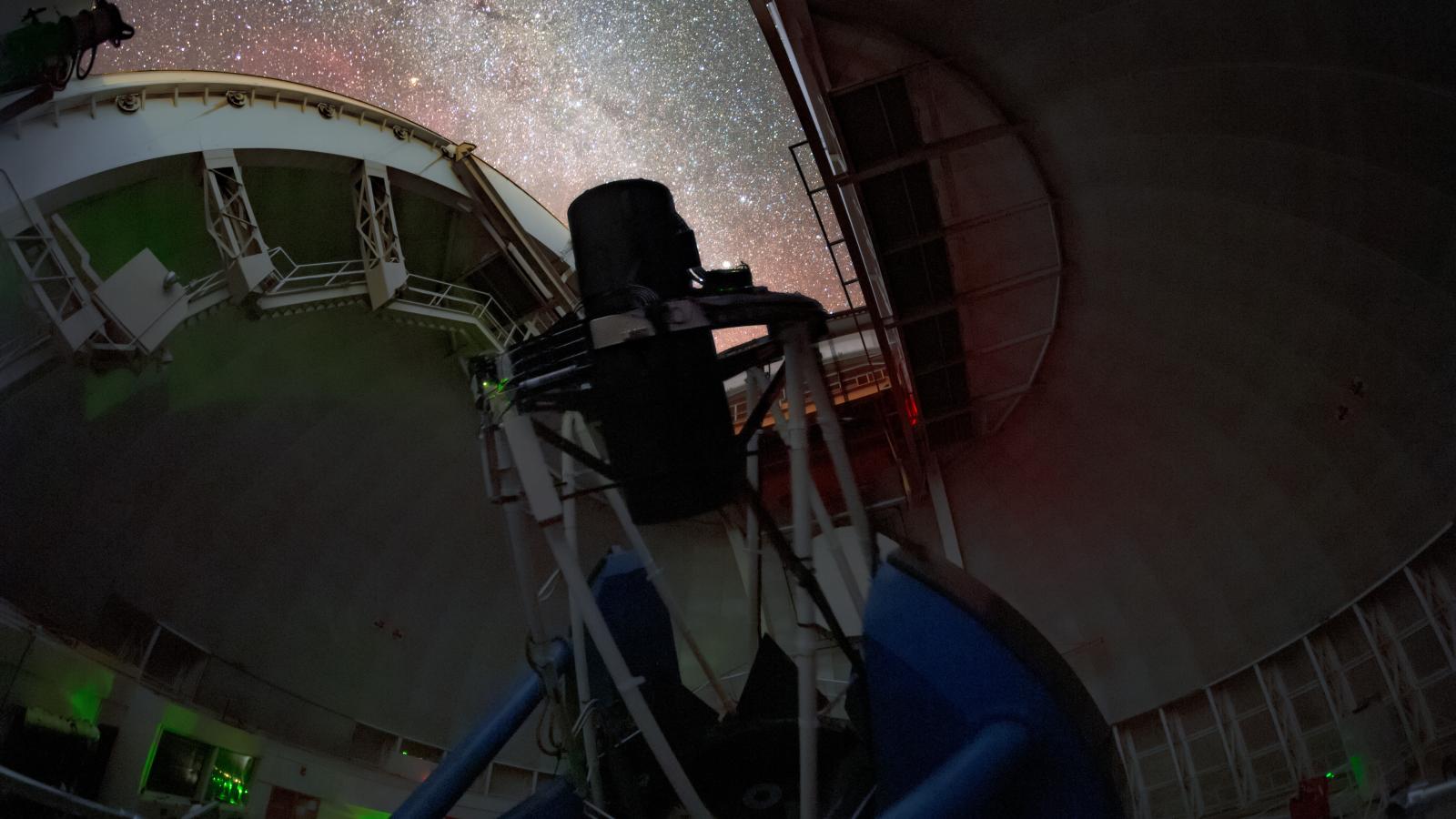 Telescope with stars above