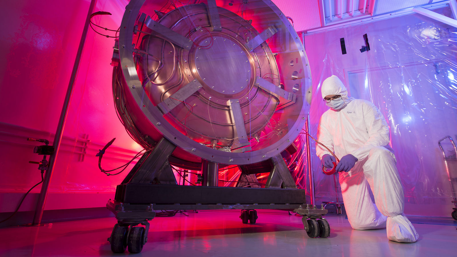 Scientist working on a new particle collider