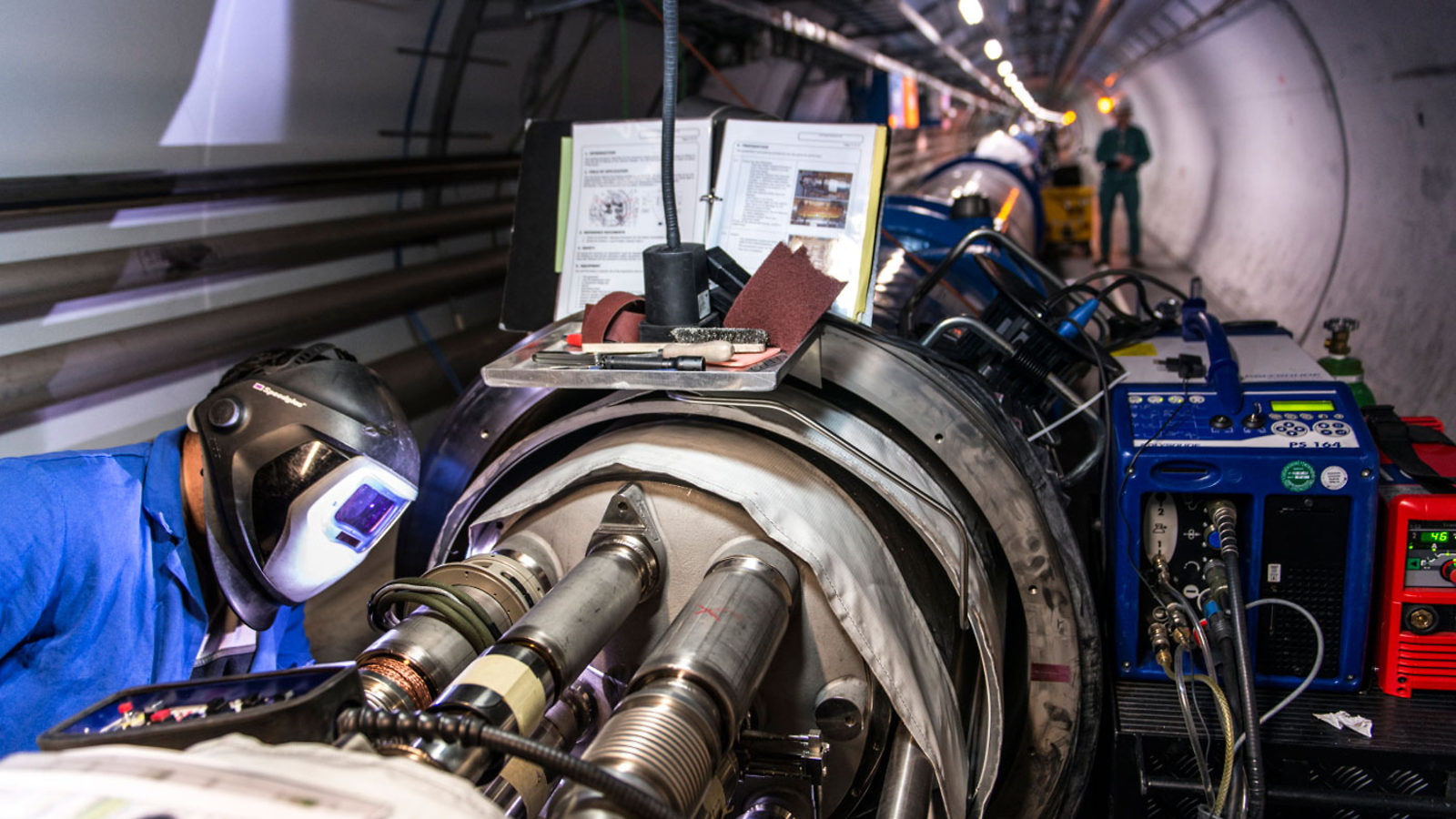Maintenance workers working on LHC Accelerator