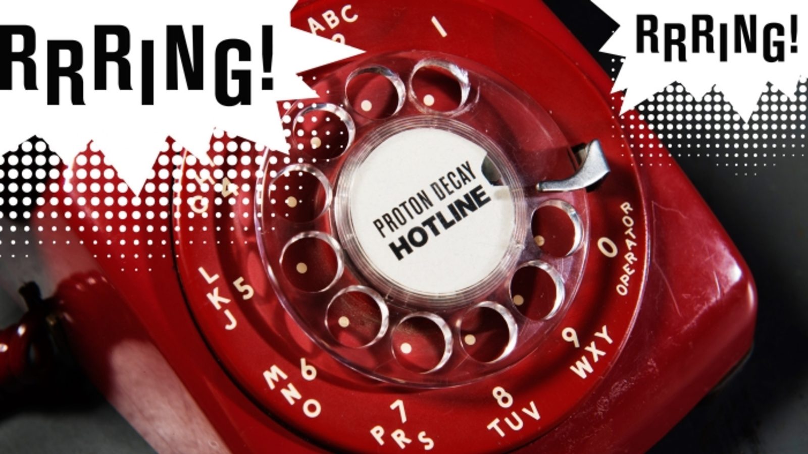 Photo of old red dial telephone that says "Rrring!"