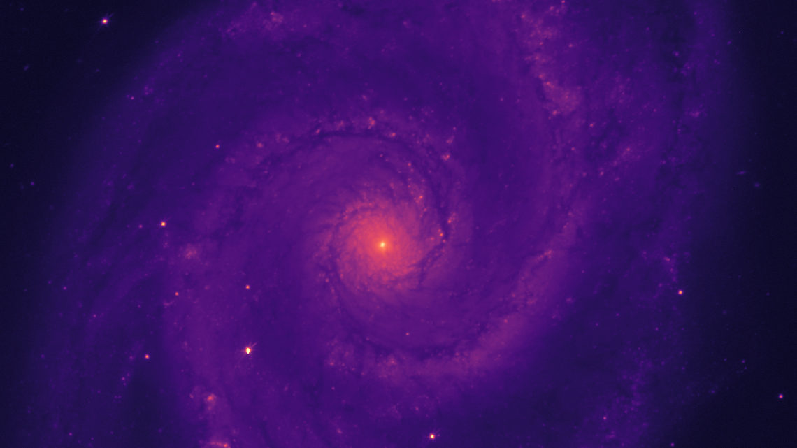 Purple-tinted image of the Whirlpool Galaxy