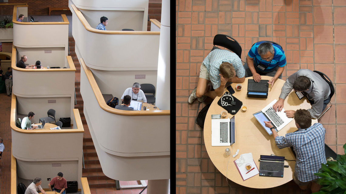 Photo of meeting in person allowed researchers to more quickly analyze approaches that answer questions about particle physics