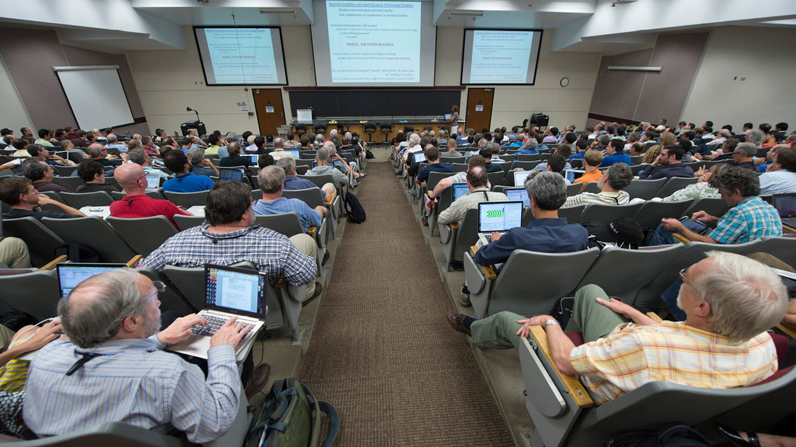 Photo of particle physicists analyzed the field’s most pressing scientific questions and shared detailed studies of the tools