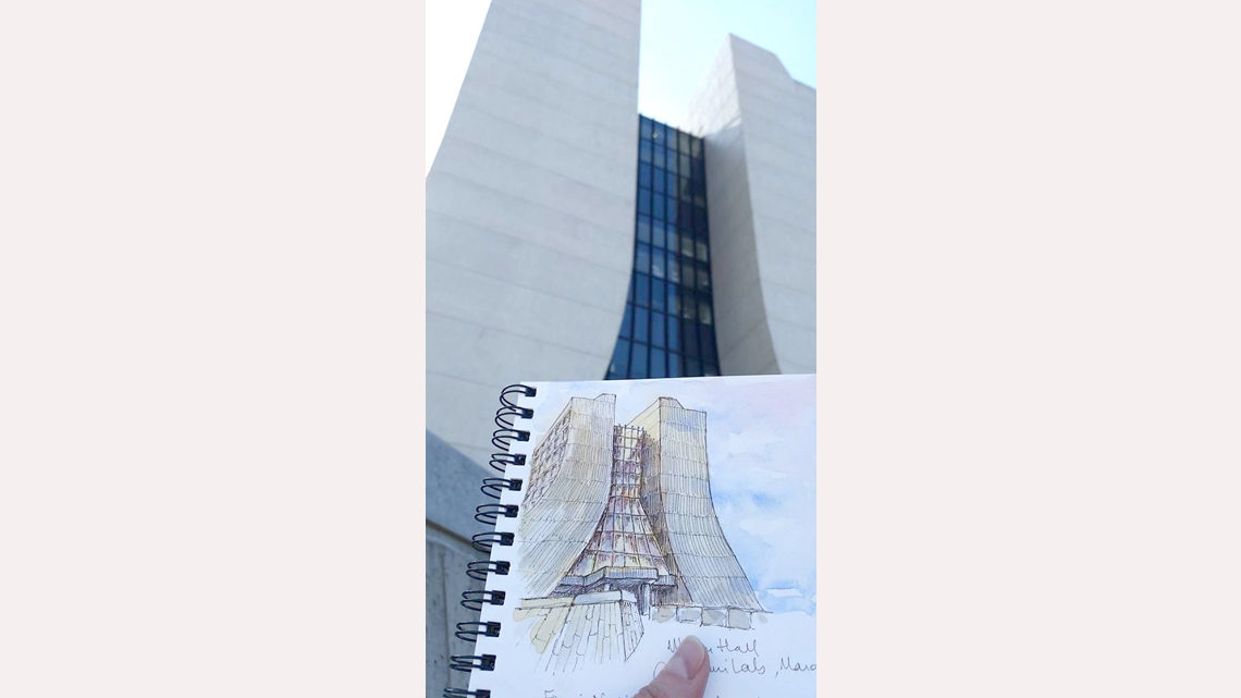 Drawing of Fermilab's Wilson Hall held up next to Wilson Hall