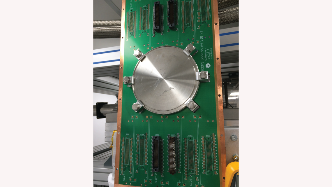 High-density vacuum interface board developed at Fermi National Accelerator Laboratory for the readout of cryogenic detectors.