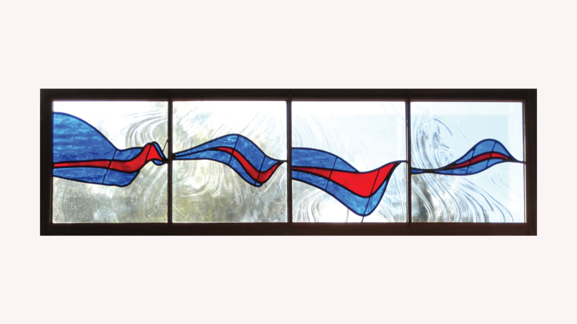 Stained glass piece inspired by Quarks and Gluons in red and blue