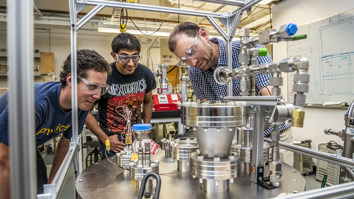 Samuel Kohn, Gael Flores, and Dan Dwyer work on ArgonCube technology at Lawrence Berkeley National Laboratory.