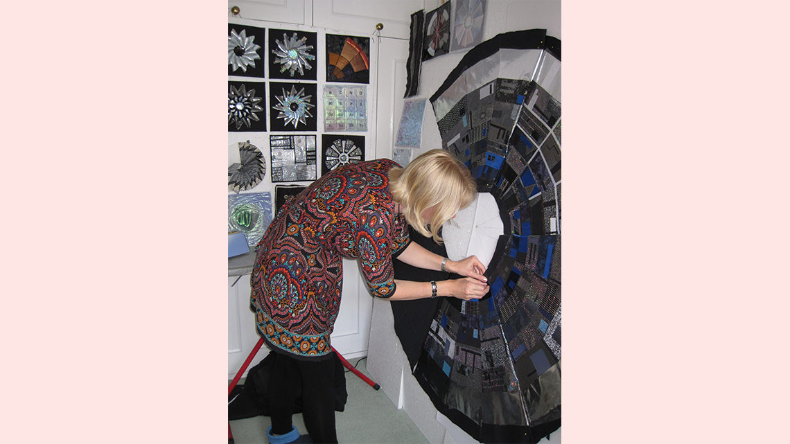 Kate working on a quilt