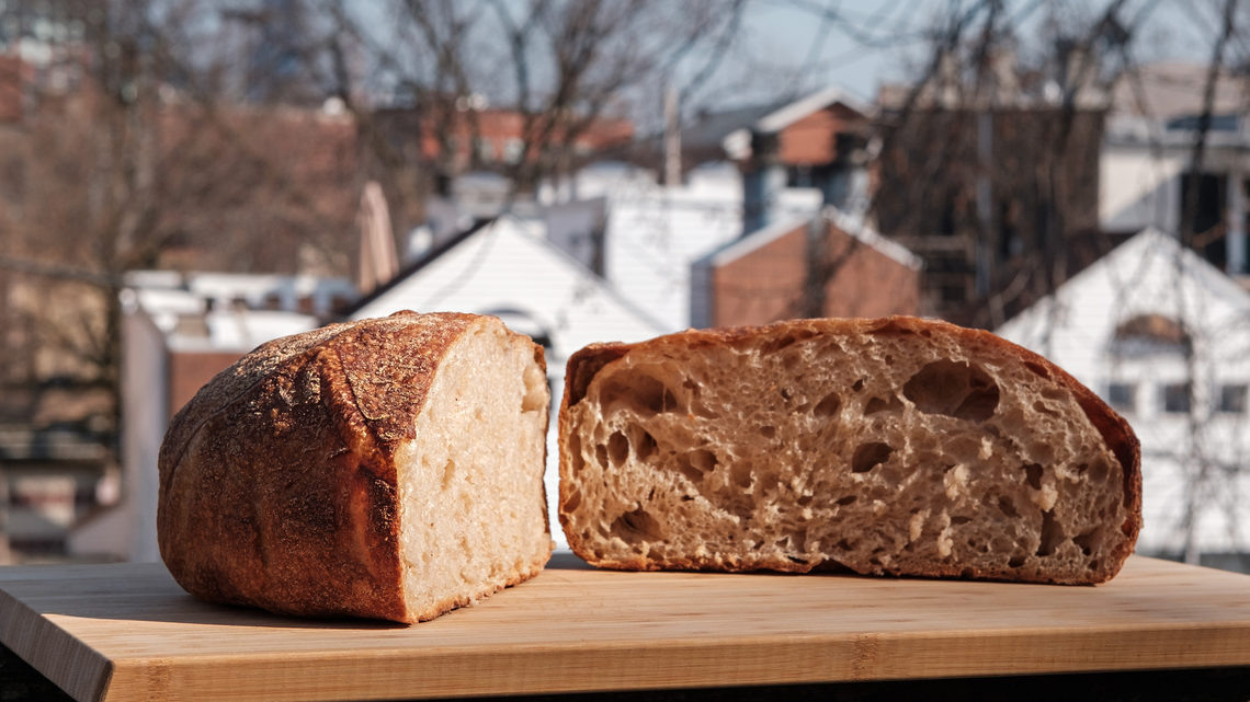 A sliced boule with Chicago in the background