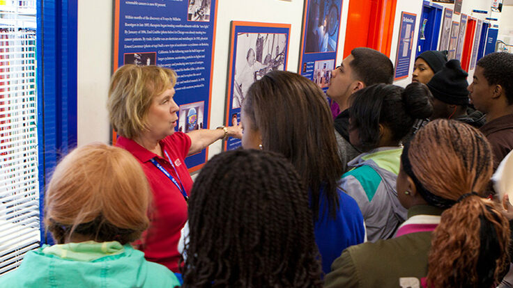 Photo of docent talking to group