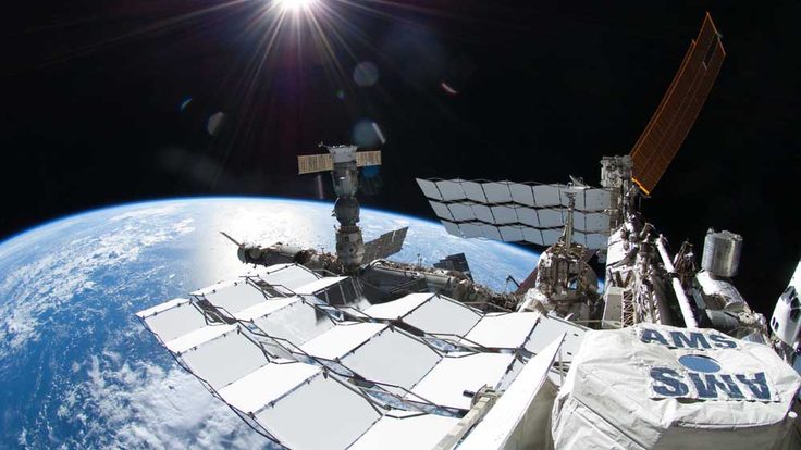 Photo of AMS on ISS outside of Earth's atmosphere