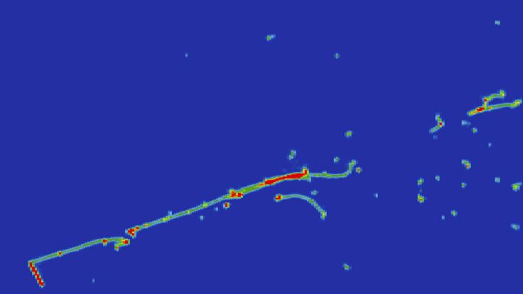 A MicroBooNE electron neutrino event showing an electron shower and a proton track.