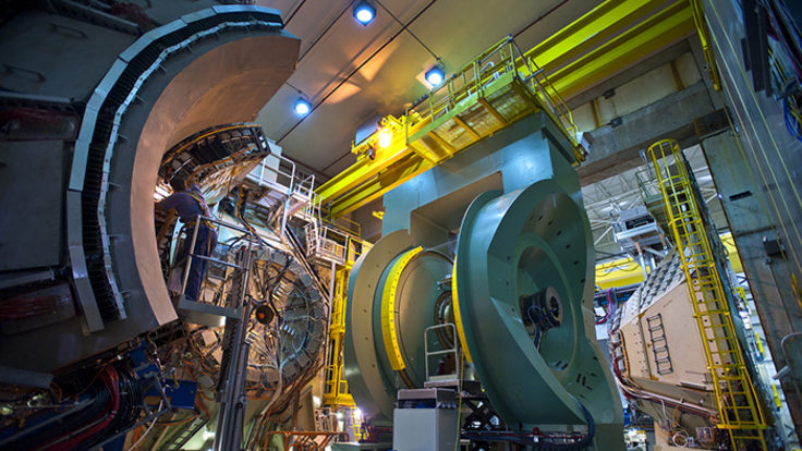 Photo of PHENIX at RHIC: muon detectors contained inside the funnel-shaped sides of the PHENIX experiment